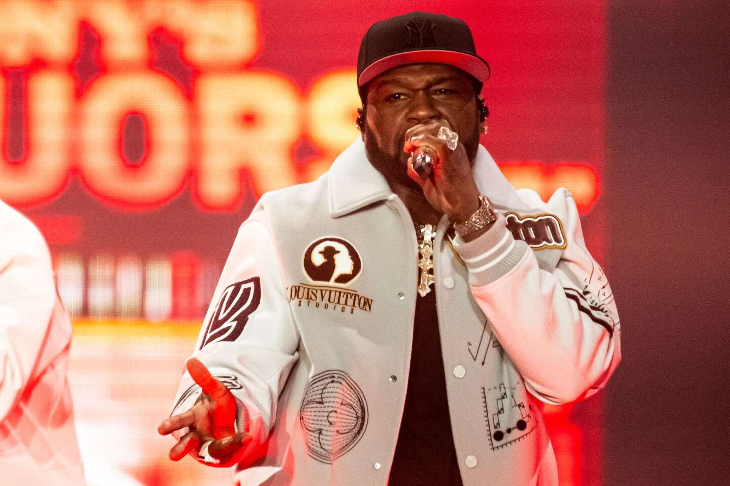The Rise of 50 Cent: From Street Hustler to Hip-Hop Mogul